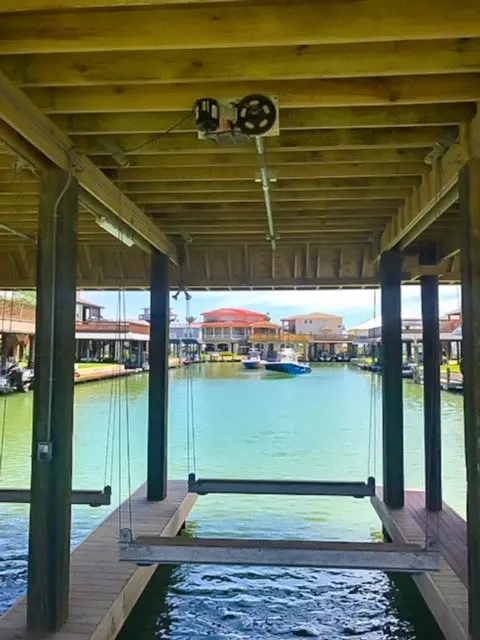 Boat Lift Distributors | 6,000 Lb Saltwater Cradle Lift | Model Sku00144 | 9' Aluminum Cradle | Capacity 6,000 Lbs | Saltwater-Ready | Motor Power 0.75 Hp | For Bay Boats & Skiffs 1