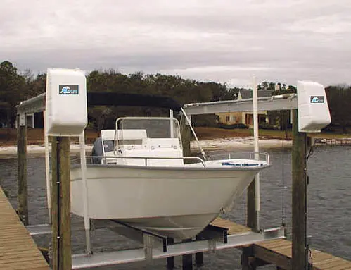Boat Lift Distributors | Storm Surge | Ss 6000 Lb Top Mount Boat Lift | Model Storm64top | Lift Capacity 6,000 Lbs | Dual 1 Hp Tenv Motors | For 4-Piling Dock Boat 1