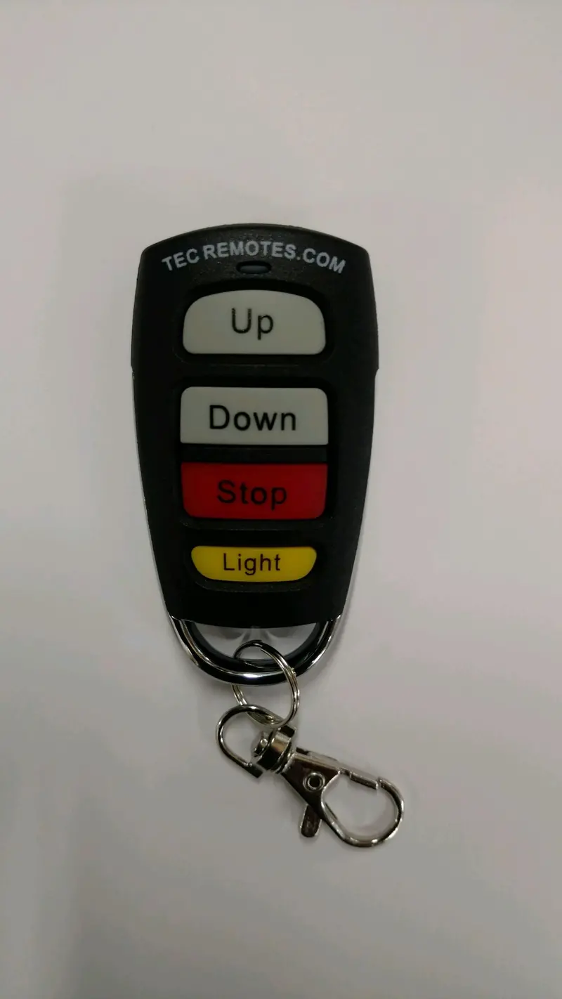 Boat Lift Distributors | Tec Remote Transmitter | Handheld Water-Resistant Remote | Dimensions 2"×2"×0.25" | Range Up To 300 Ft | For Tec Boat Lift Systems (2015+) 1