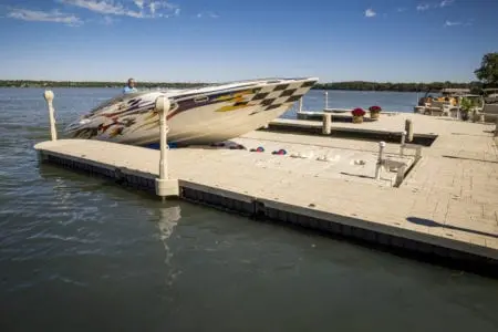 Boat Lift Distributors | Wave Armor | Extreme X24 Boat Port | Length 24' | Port Width 10' | Weight Capacity 8000 Lbs | Manual Drive-On Dock | For Boats 23'–32' 2