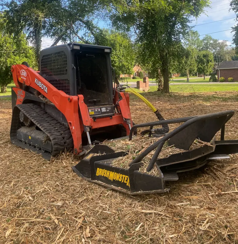 Brushmonster Mulcher | Model Revolution Axe Series | 64"–77" Cutting Width | Axial Piston Motor | 15–45 Gpm | Ar400 & 5160 Blades | For Skid-Steer Loaders 1