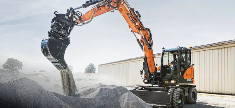 Develon | Mini Wheel Excavator | Model Dx100w-7 | Dig Depth 13' 11" | 100.6 Hp | 12.6 Tons | For Compact Excavation & Urban Construction 1