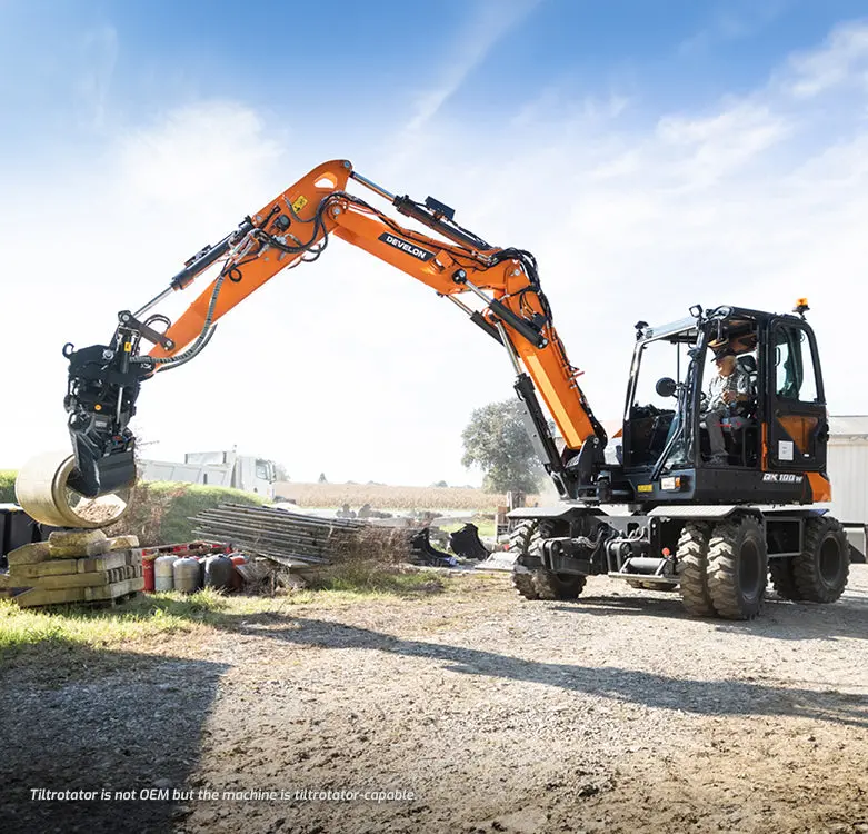 Develon | Mini Wheel Excavator | Model Dx100w-7 | Dig Depth 13' 11" | 100.6 Hp | 12.6 Tons | For Compact Excavation & Urban Construction 4